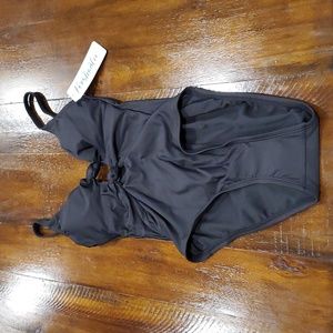 Adorable one piece black swim suit.